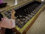 Tudung Manto dan Permainan Gasing Lingga Dapat Pengakuan Hak Cipta