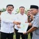 Menteri ATR/BPN Hadi Tjahjanto membagikan 1000 Sertifikat Hak Atas Tanah (SHAT) dari Program Pendaftaran Tanah Sistematis Lengkap (PTSL), di Kabupaten Bogor, pada Selasa 12 Februari 2024.