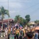 Foto: Ribuan warga padati Jl Merdeka Kotaagung saksikan karnaval HUT RI ke 79, pada Senin 19 Agustus 2024.