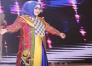 Ketua Dekranasda Bekasi Tampil Memukau dengan Batik Motif Bambu dan Mpok Asih di Munas APEKSI